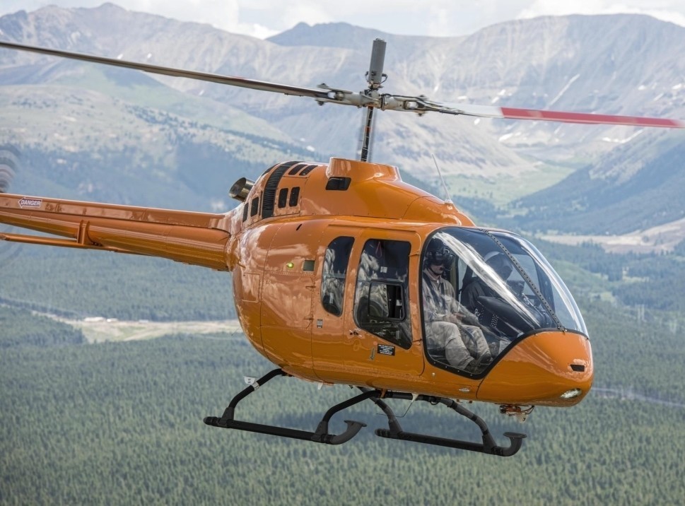 Bell 505 helicopter in flight