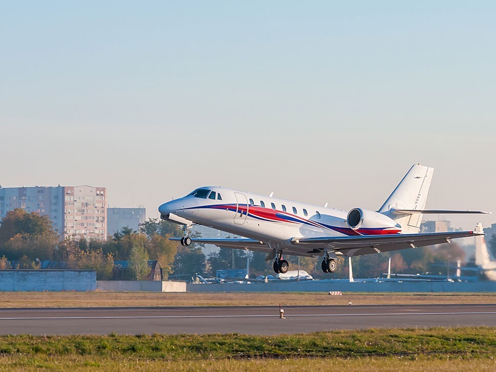 A Cessna Citation Mid-size Jet taking off