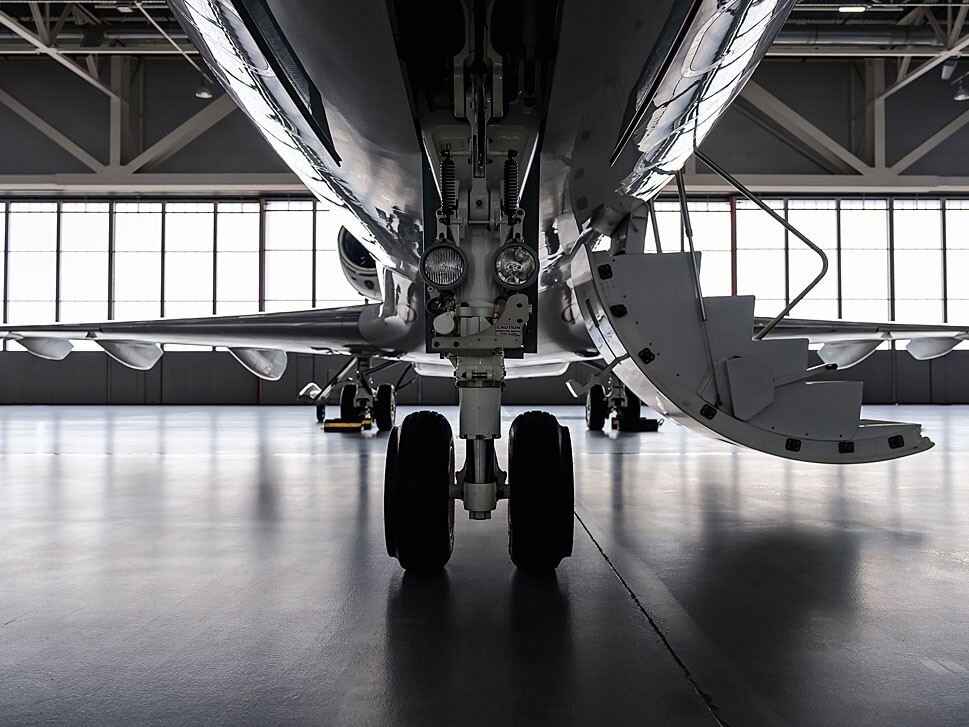 Private jet in a deserted hangar